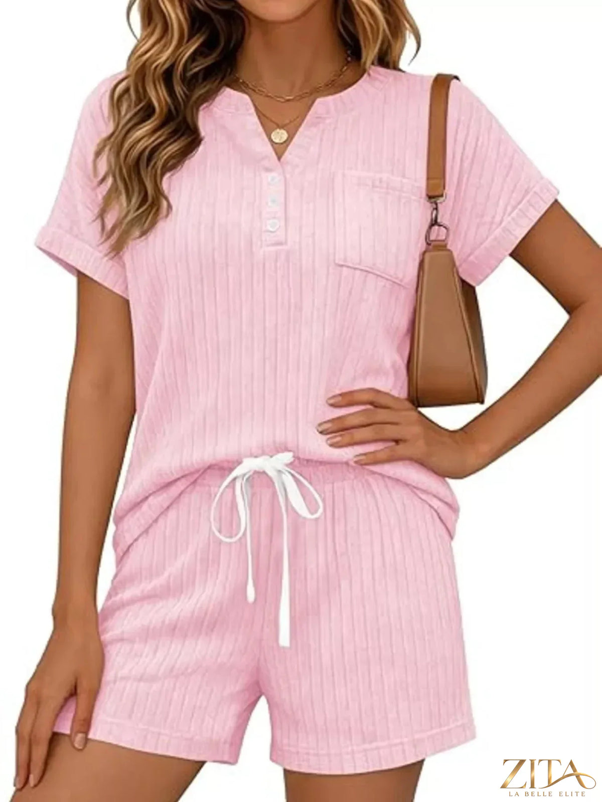 Casual ribbed knit tee and shorts set from Trendsi, featuring a relaxed fit and comfortable fabric in neutral tones.