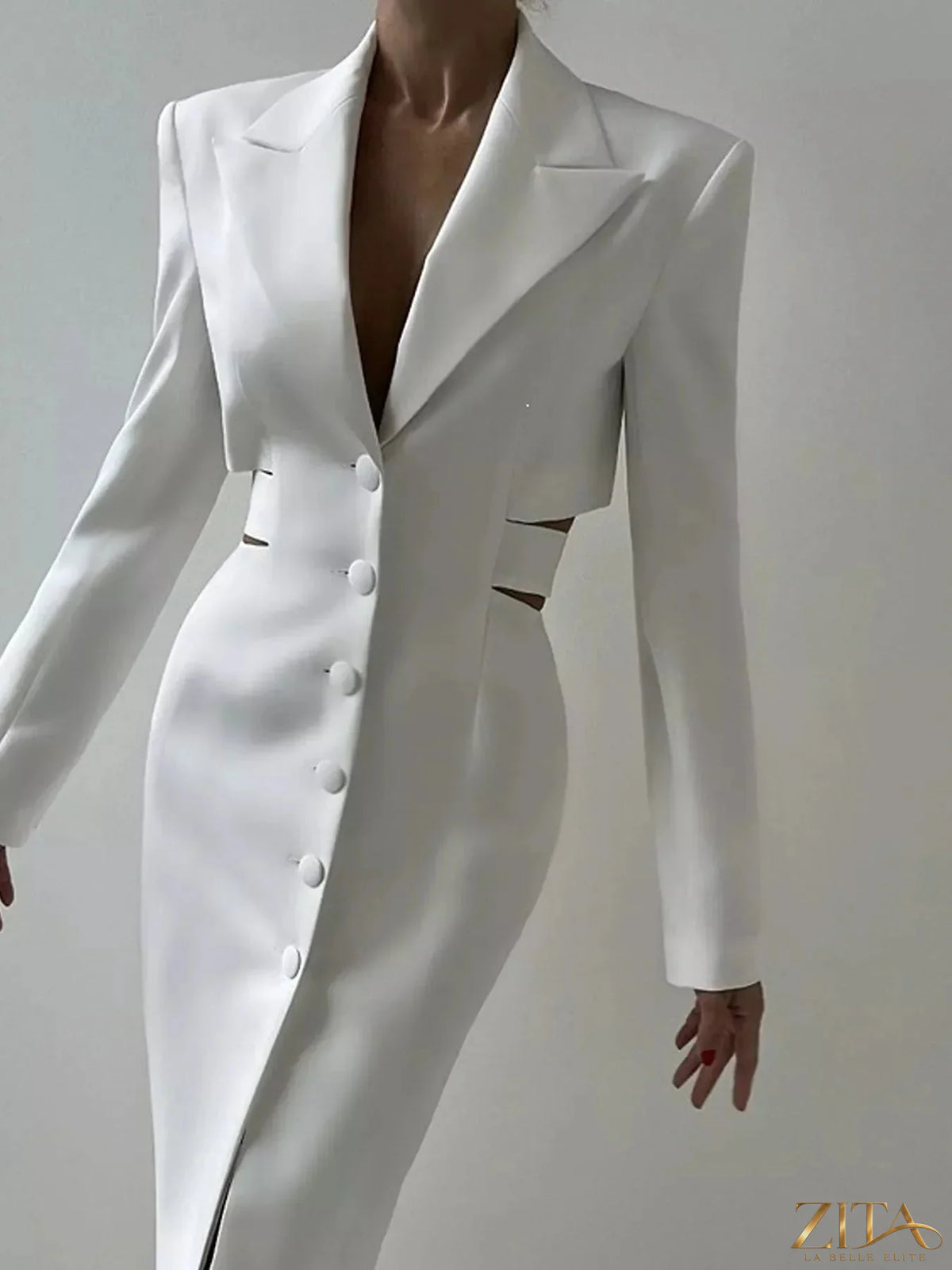 Zita La Belle Elite button-down blazer dress with stylish cut-out waist, tailored fit, and classic lapel collar on a model.