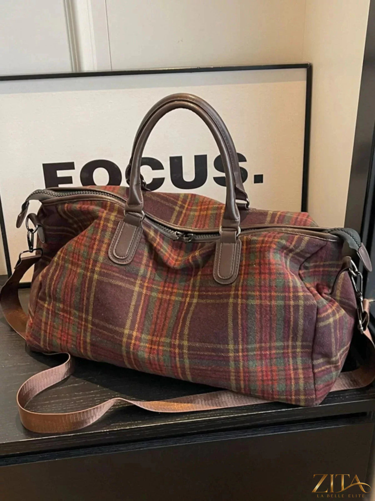Vintage plaid pattern travel bag by Zita La Belle Elite, featuring durable fabric, leather accents, and spacious interior for travel use.