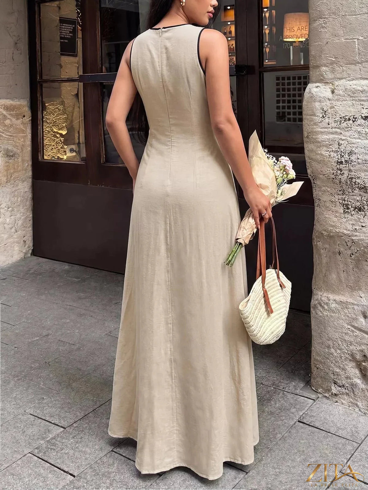 Zita La Belle Elite sleeveless V-neck maxi dress in flowy fabric, full-length design, elegant and perfect for summer occasions.