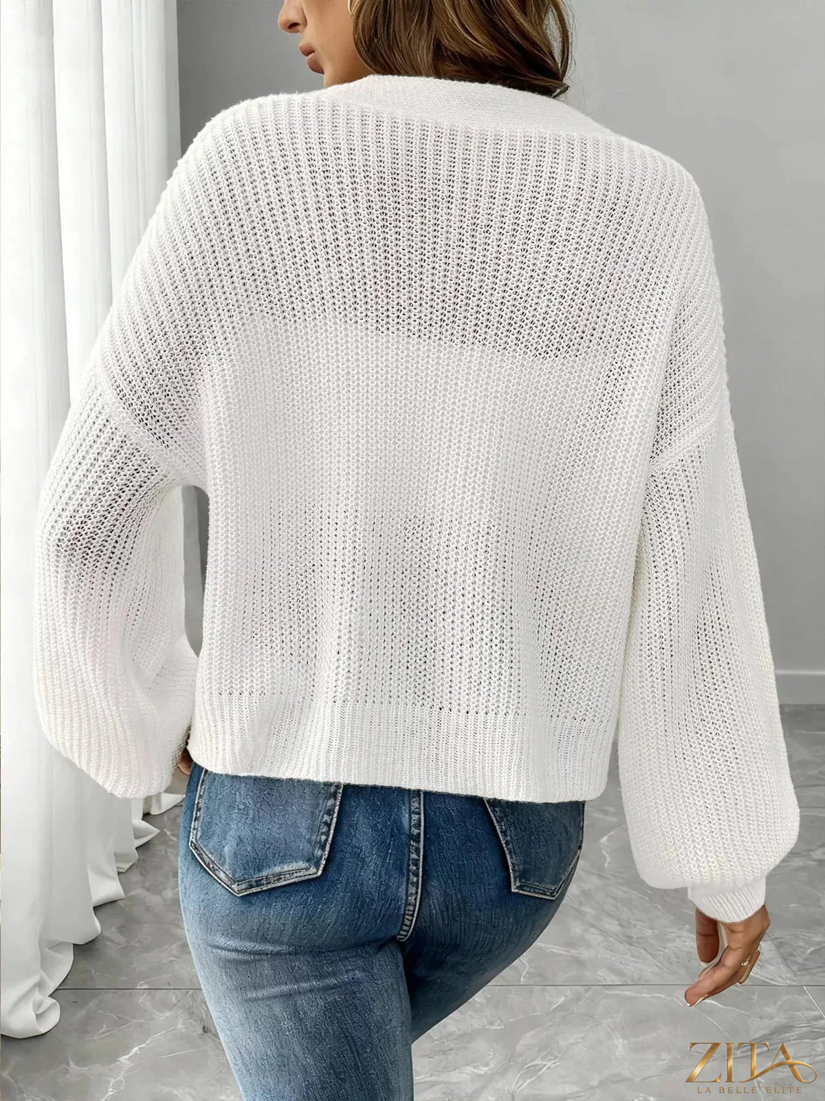 Zita La Belle Elite elegant v-neck button-down ribbed knit cardigan showing its fitted design and classic ribbed texture.