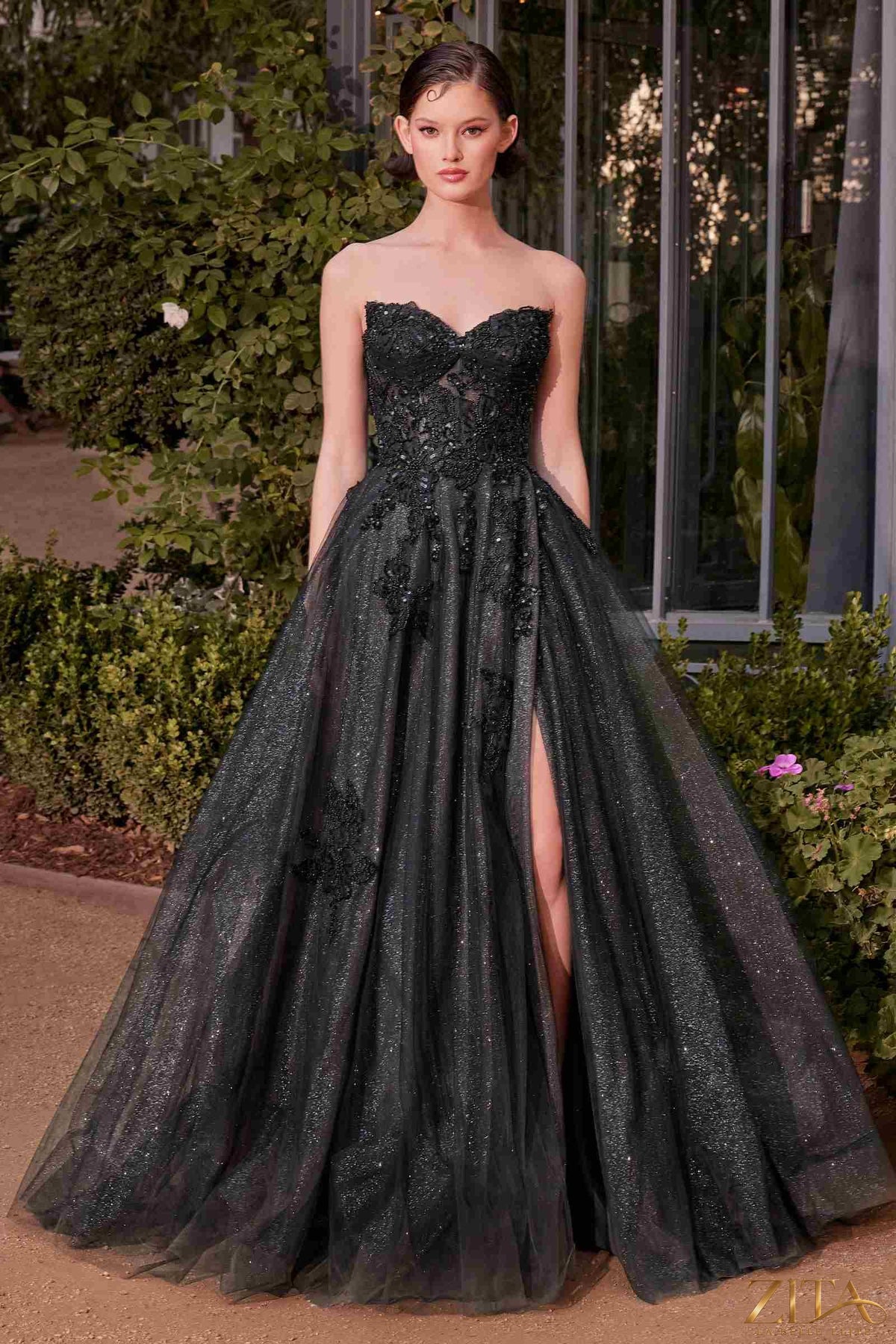 Black and nude strapless layered tulle ball gown from Zita La Belle Elite, featuring a voluminous skirt and elegant design.