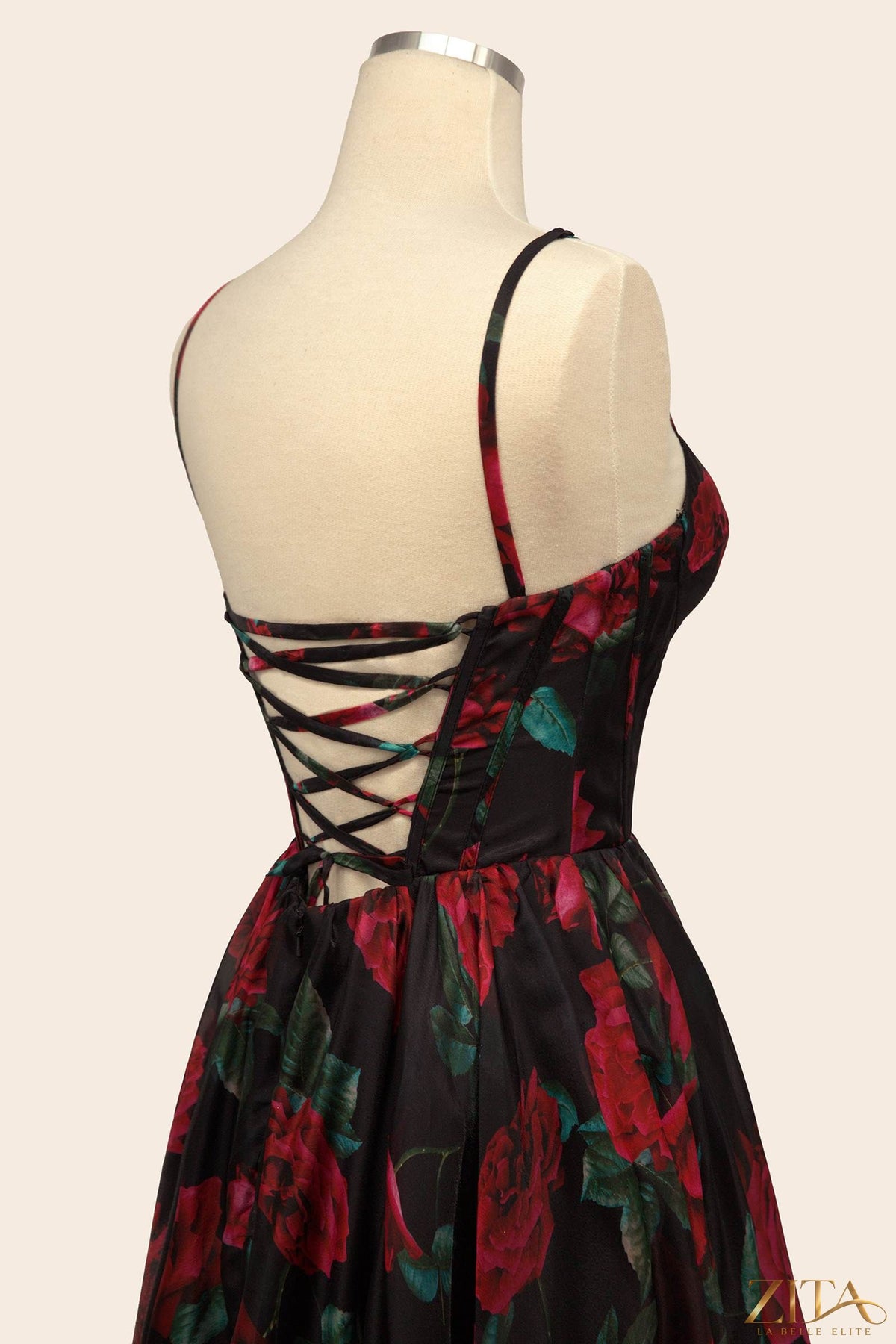 Elegant rose print organza gown by Zita La Belle Elite, featuring flowing fabric and intricate floral design.