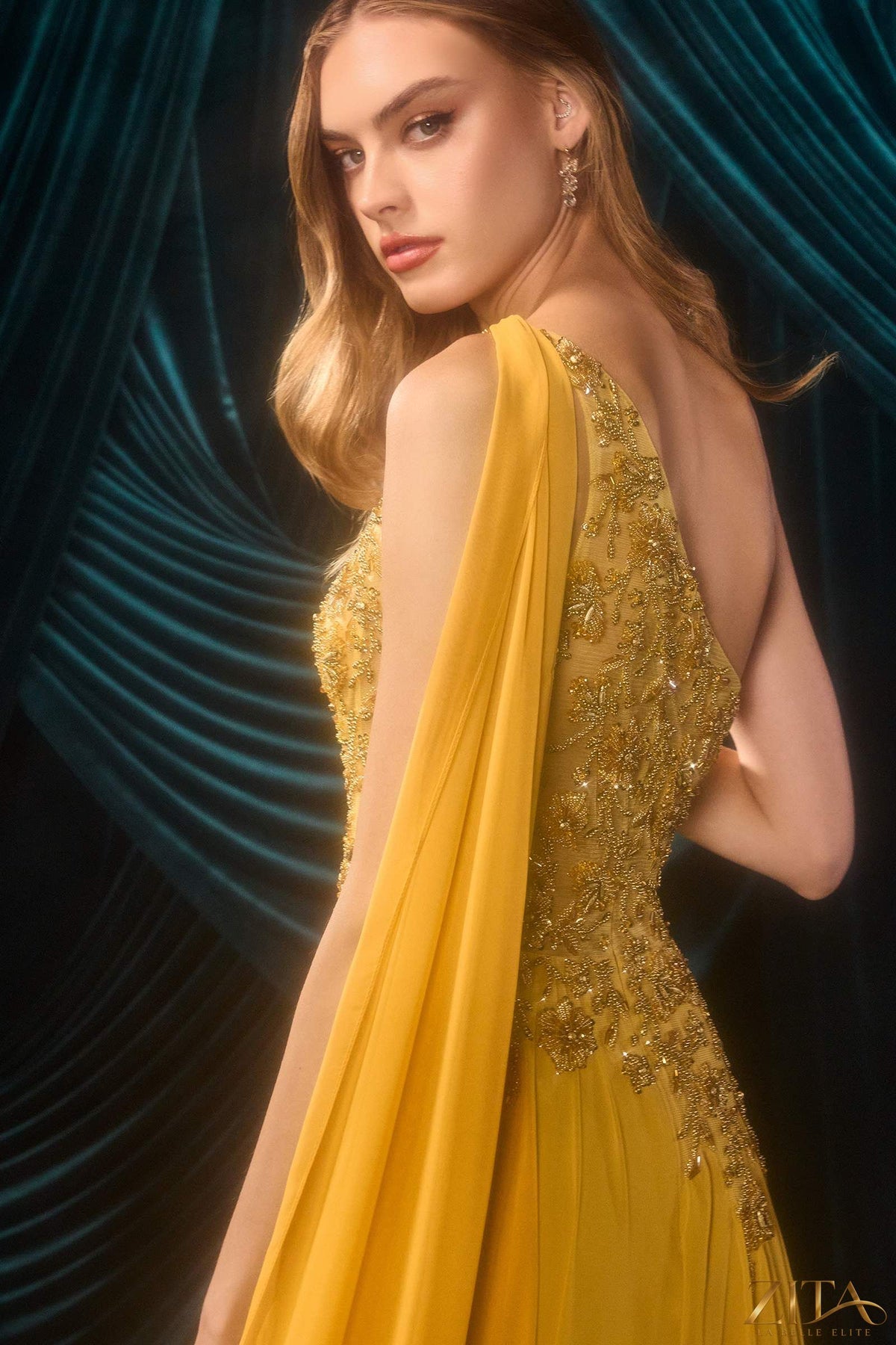 Marigold one-shoulder chiffon A-line formal dress by Zita La Belle Elite, featuring elegant design and flowing fabric.