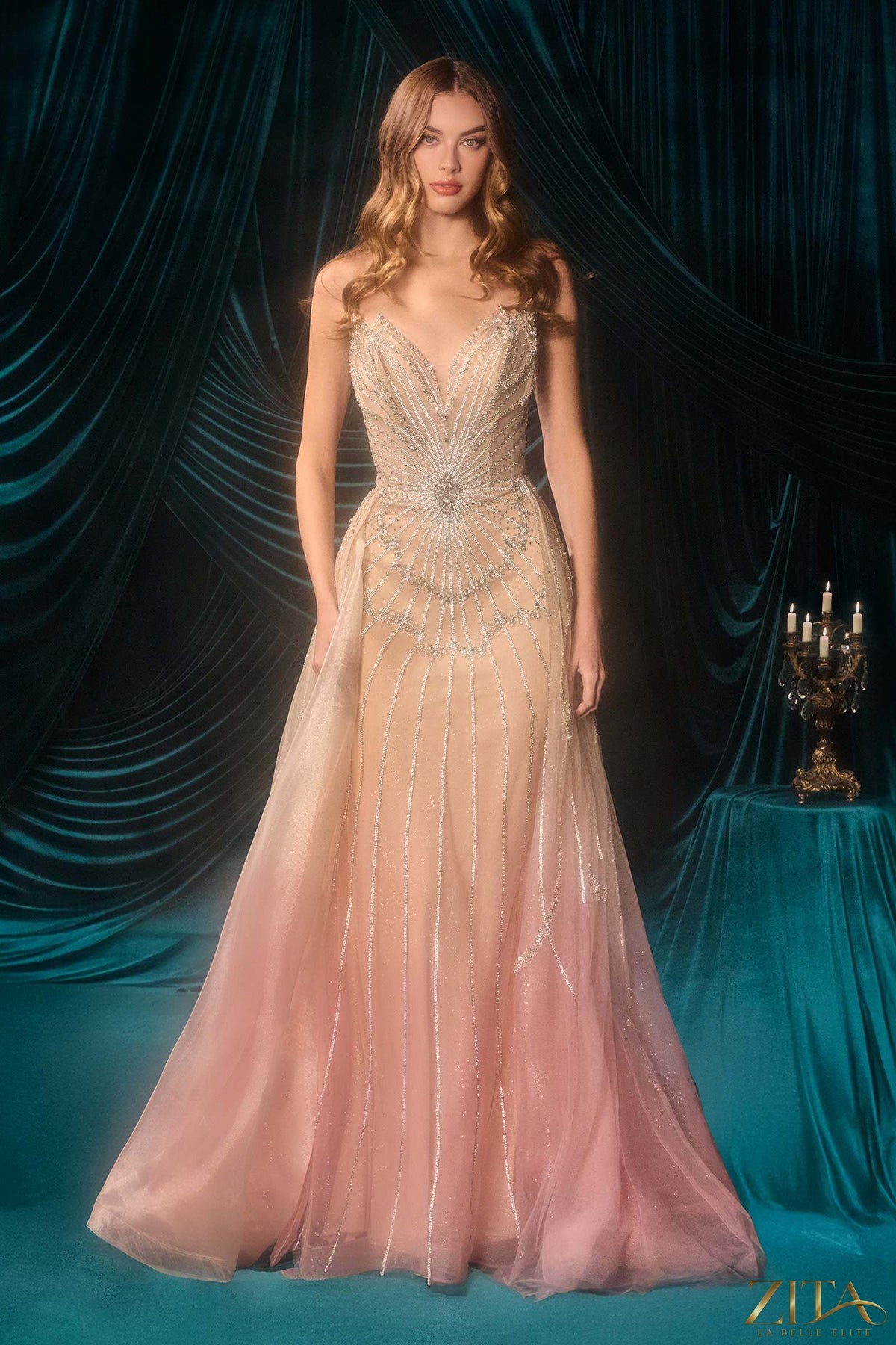 Elegant fitted layered overskirt formal gown by Zita La Belle Elite with champagne blush ombre pattern, front view.