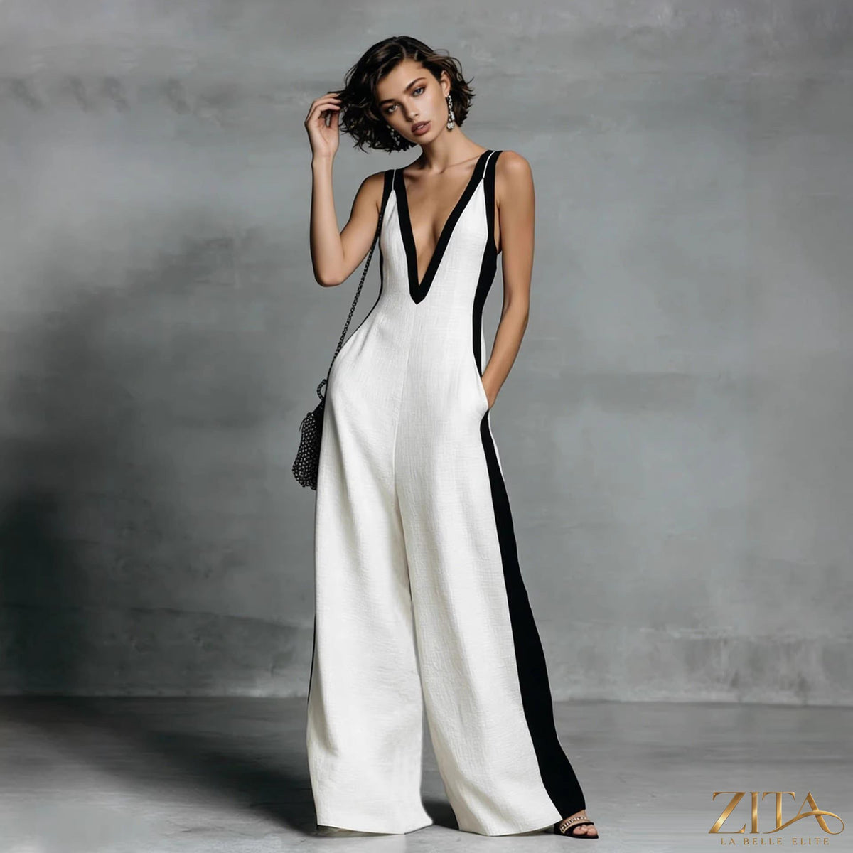 Color-block sleeveless V-neck wide-leg jumpsuit by Zita La Belle Elite, featuring bold color blocks and a relaxed casual fit.
