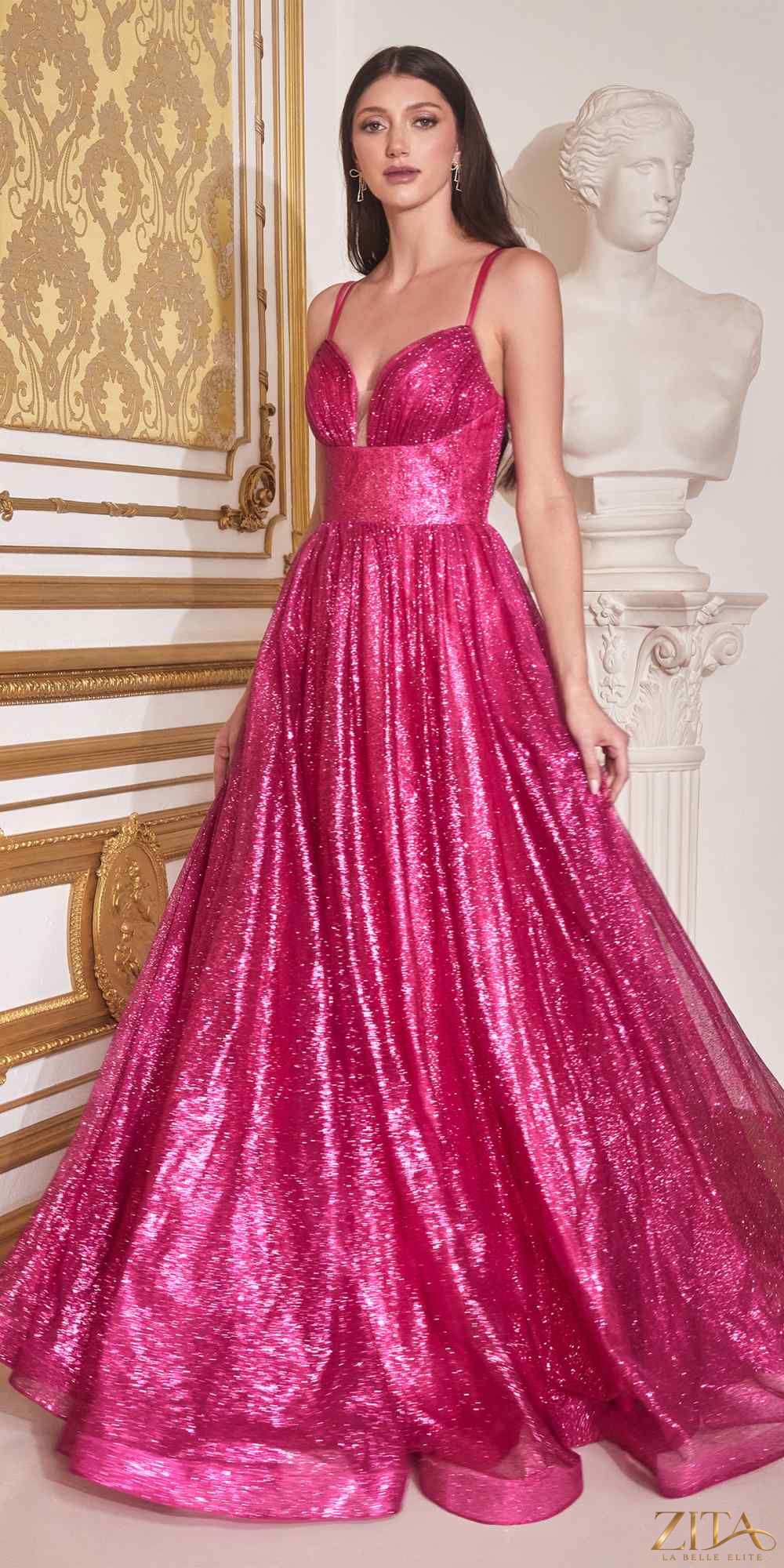 Fuchsia floor-length A-line glitter ball gown by Zita La Belle Elite, featuring a flowing silhouette and sparkling embellishments.