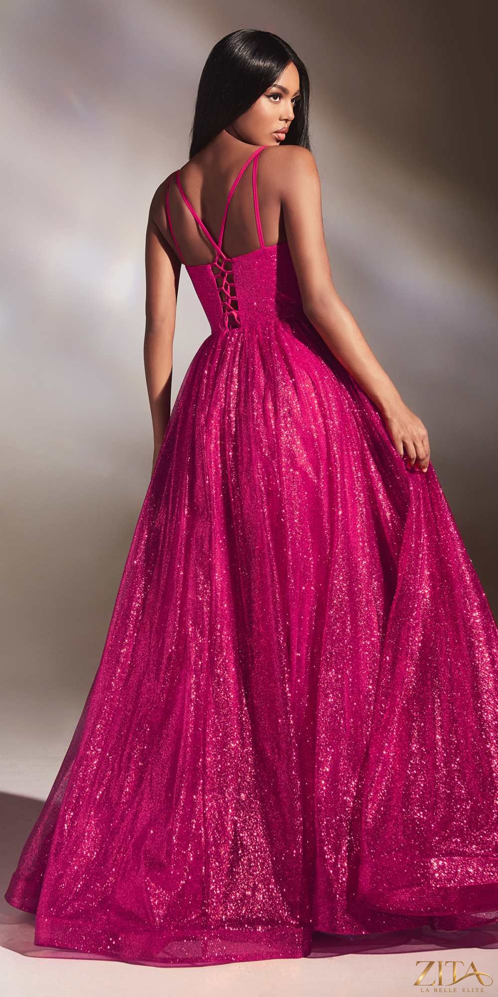 Fuchsia floor-length A-line glitter ball gown by Zita La Belle Elite, featuring a fitted bodice and flowing skirt.