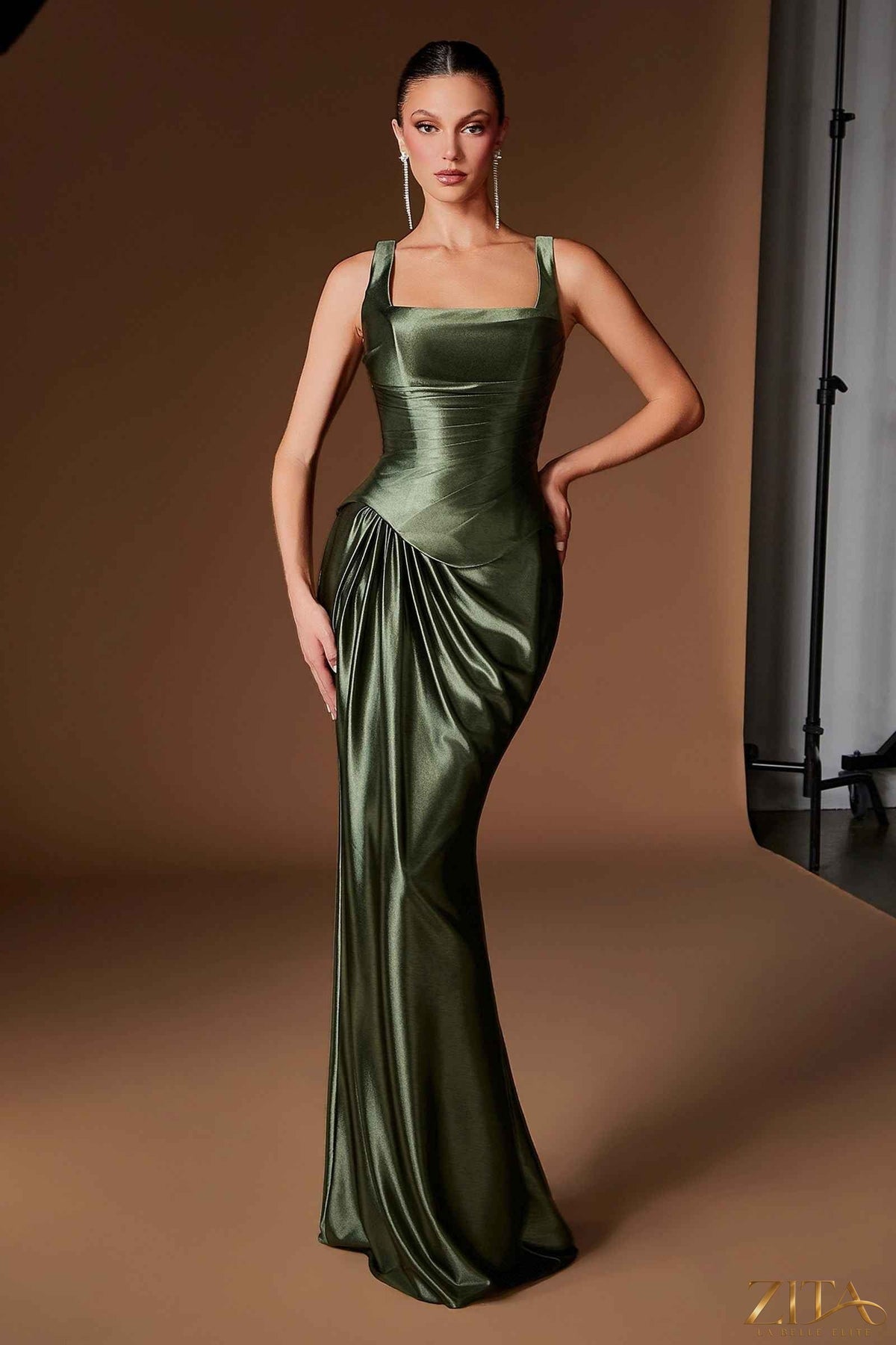 Olive green square neck satin fitted evening gown with draped waist by Zita La Belle Elite, front view.