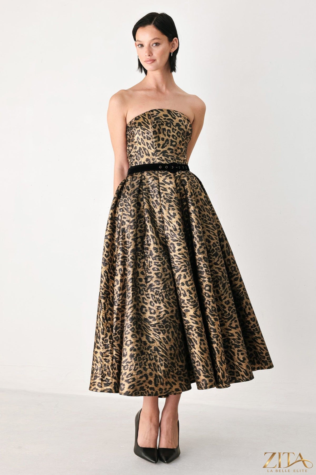 Zita La Belle Elite Wildly Golden Leopard strapless midi dress with a fitted bodice and flowing skirt, black and gold leopard print.