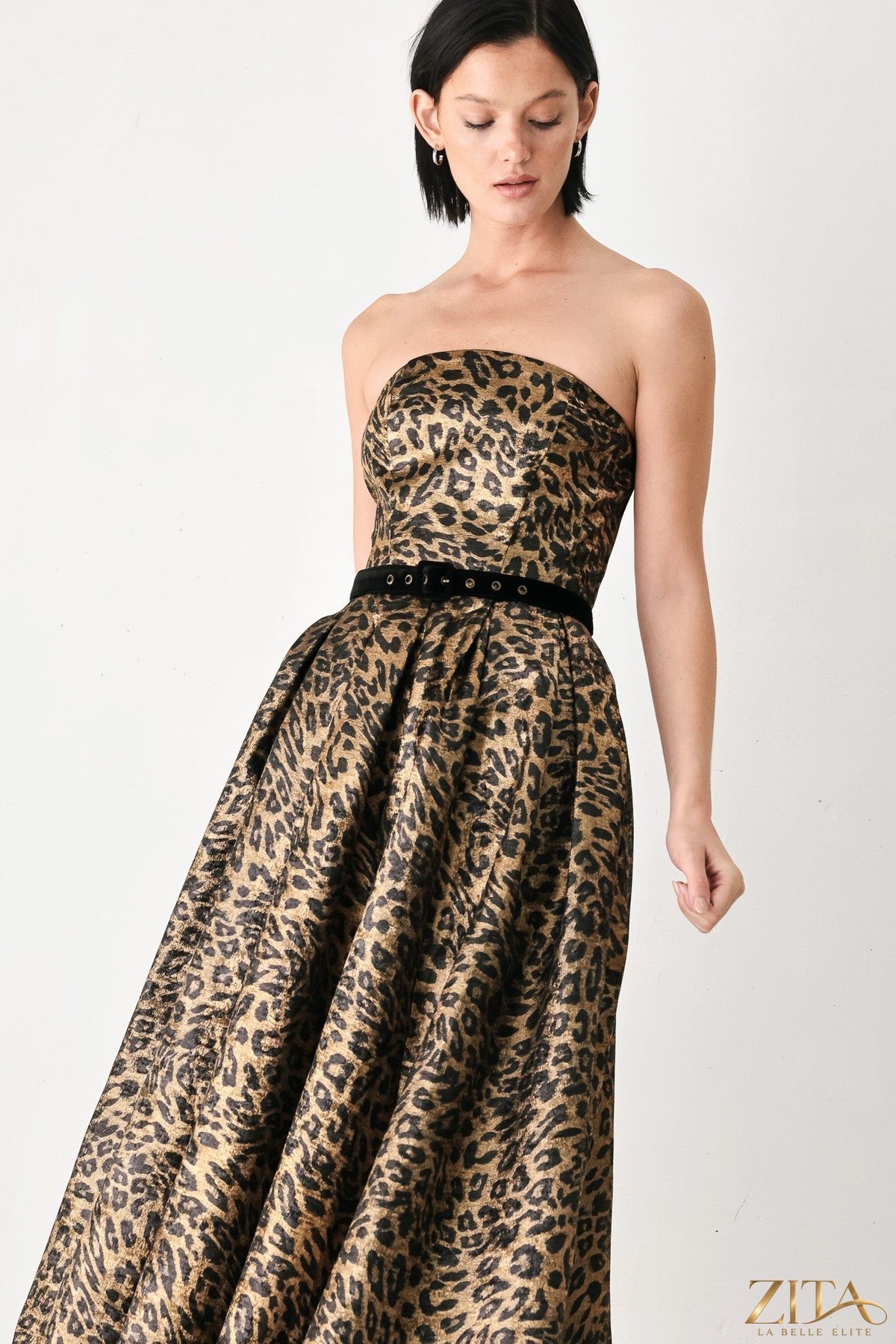 Wildly golden leopard strapless midi dress by Zita La Belle Elite, featuring a fitted silhouette and bold animal print.