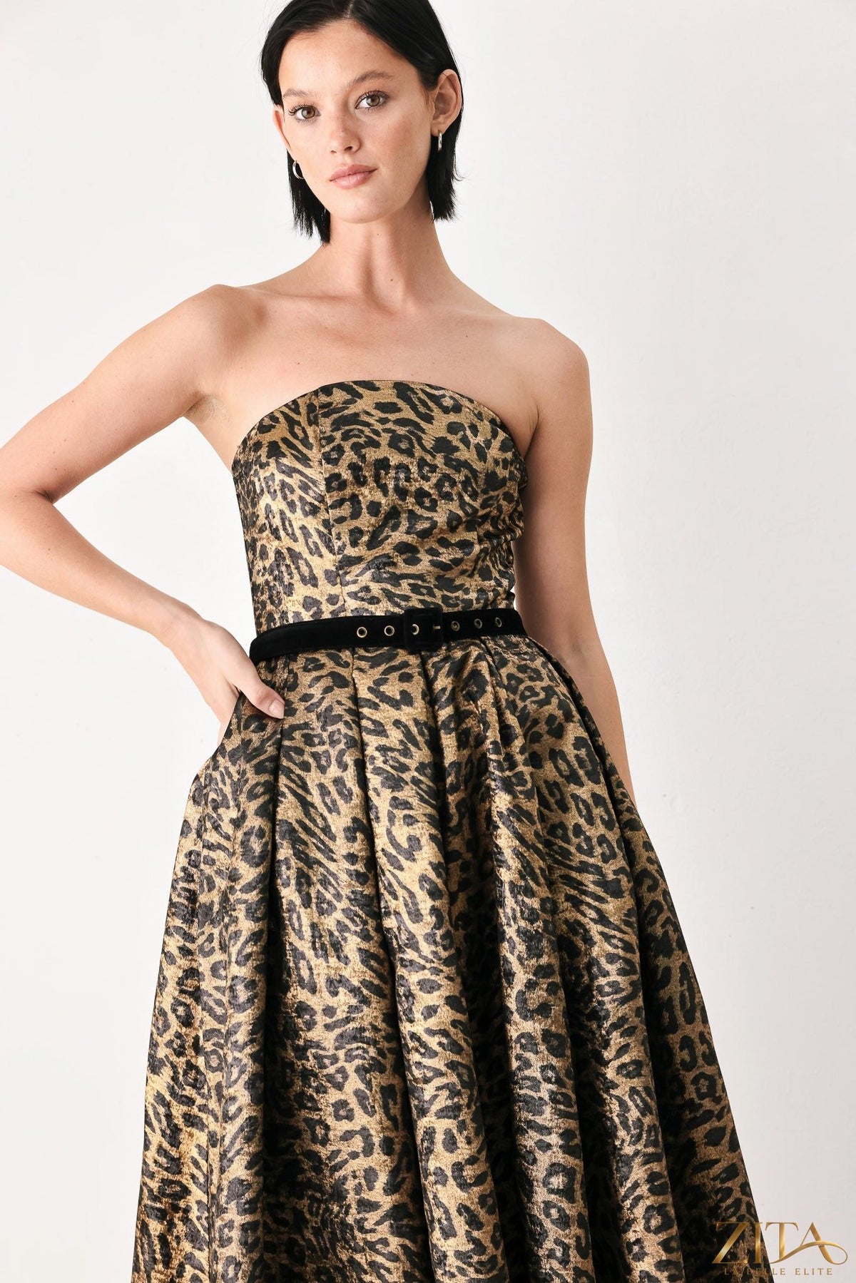 Zita La Belle Elite Wildly Golden Leopard strapless midi dress in gold and black fabric, fitted with a sleek, elegant silhouette.