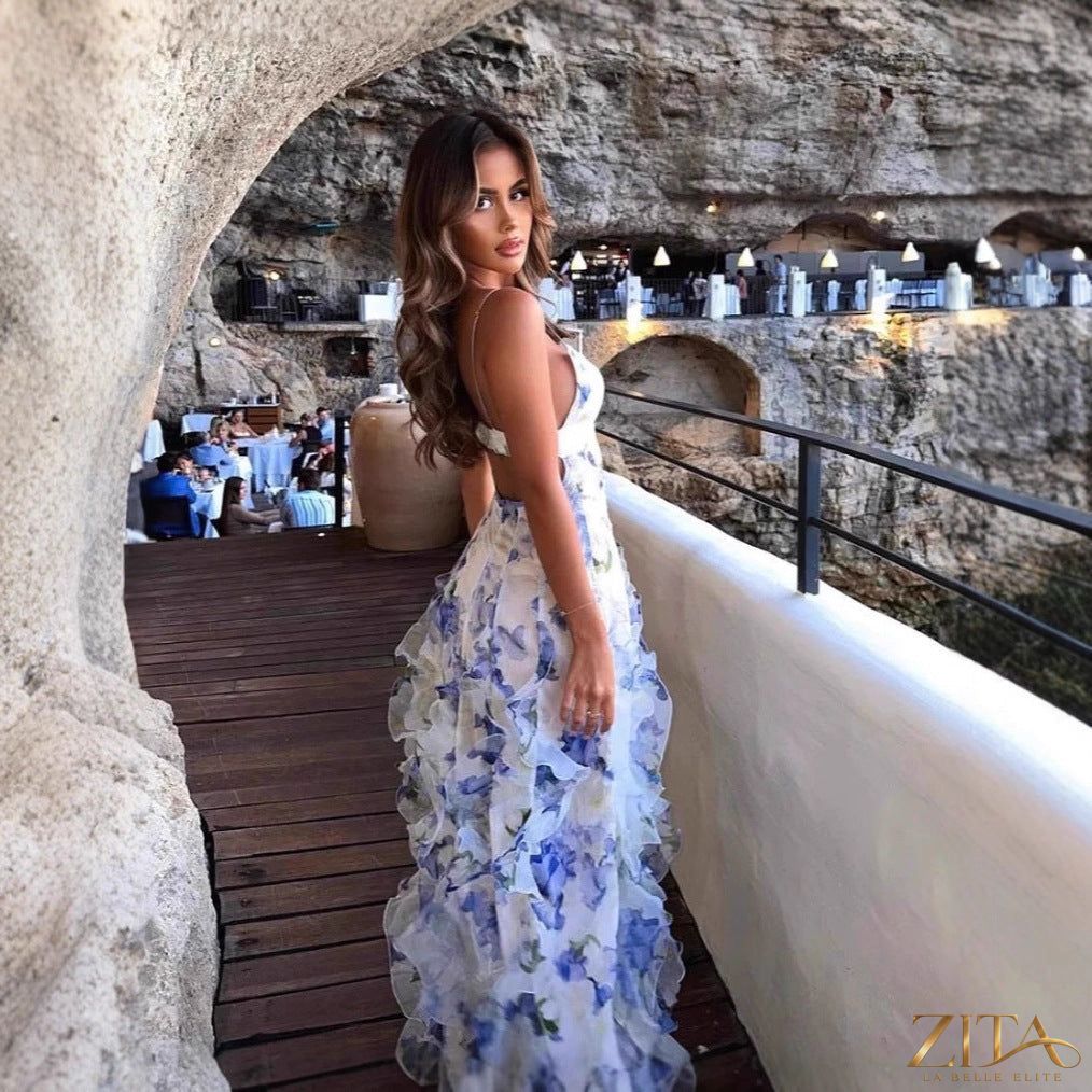 Elegant off-the-shoulder printed chiffon evening gown by Zita La Belle Elite, featuring a flowing silhouette and intricate pattern.