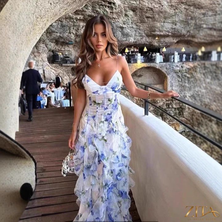 Elegant off-the-shoulder printed chiffon evening gown by Zita La Belle Elite, shown in a flowing, stylish design.