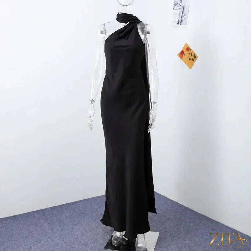 Backless lace-up maxi dress by Zita La Belle Elite, sleeveless evening gown with ribbon detail and elegant party dress design.