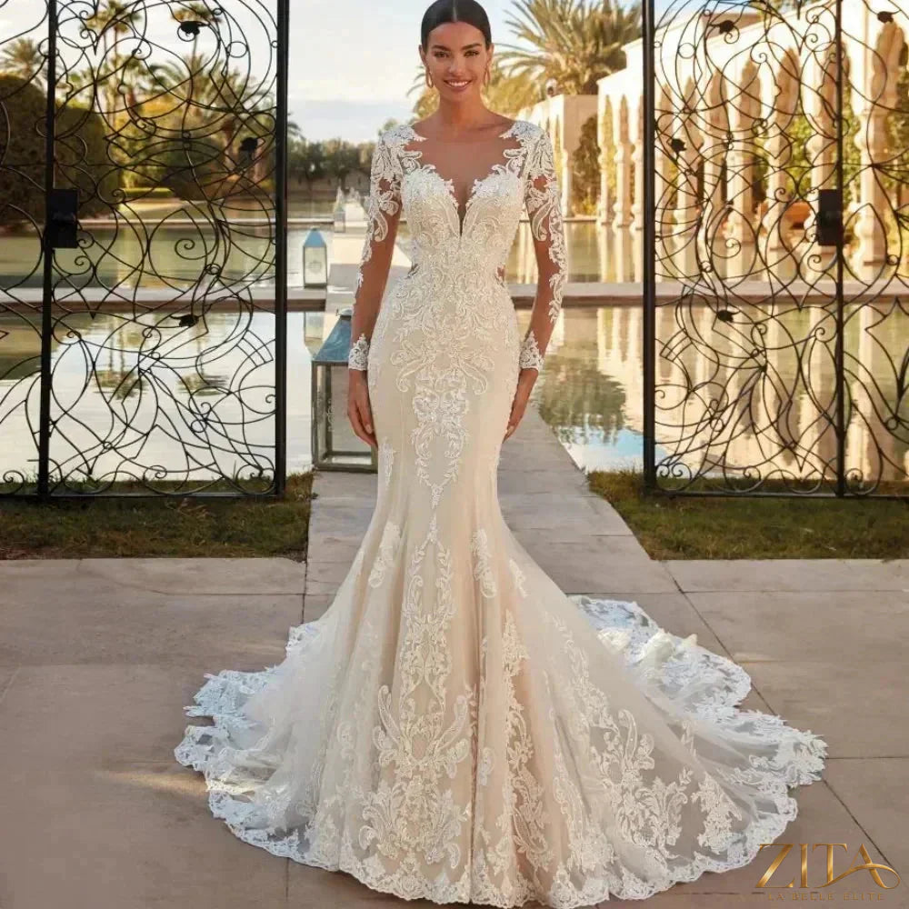 Elegant boho mermaid wedding dress by Zita La Belle Elite with long lace sleeves and customizable fit, featuring intricate lace details.