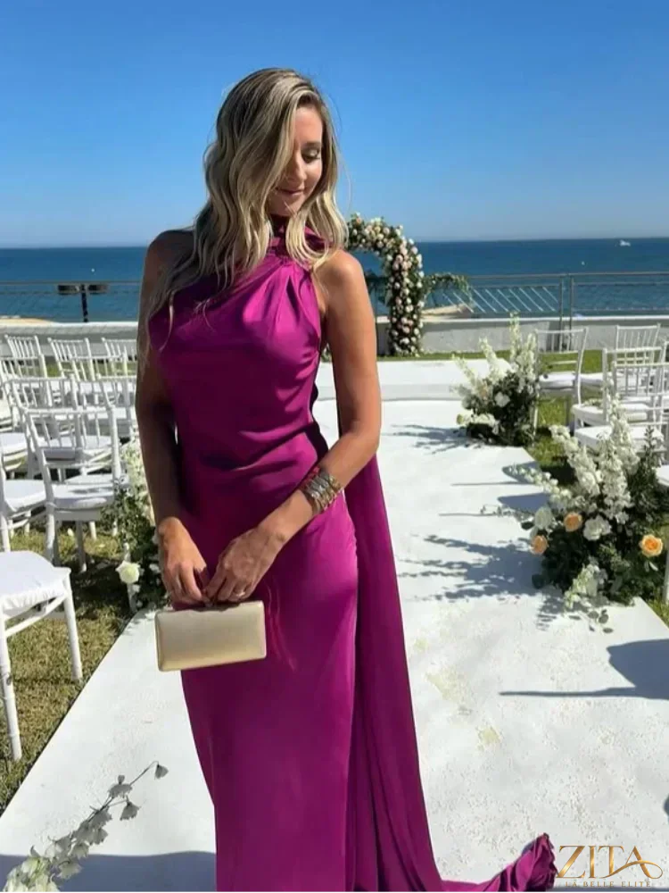 Backless lace-up maxi dress by Zita La Belle Elite featuring a sleeveless design and elegant ribbon details, perfect for evening parties.