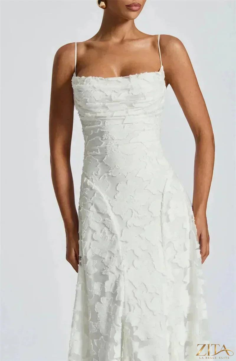 Elegant backless spaghetti strap lace-up maxi evening dress for women by Zita La Belle Elite, featuring flowing fabric and stylish design.