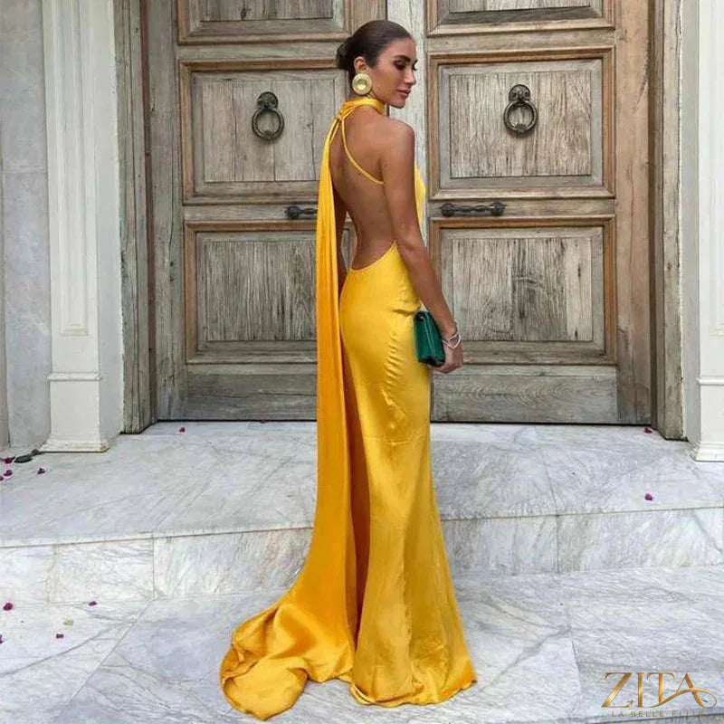 Zita La Belle Elite backless lace-up maxi party dress with sleeveless ribbon design, elegant evening gown with flowing fabric.