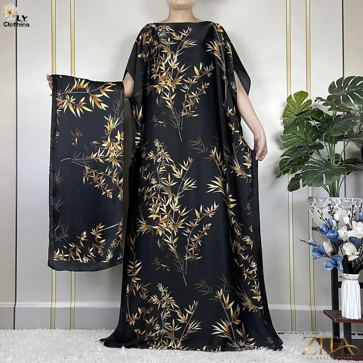 Women’s printed silk maxi summer dress by Zita La Belle Elite featuring a loose fit, belt, and turban for elegant summer style.