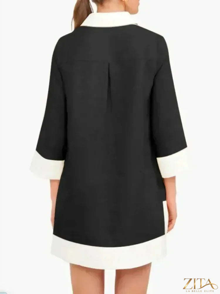 Contrast color button-down shirt mini dress by Zita La Belle Elite, featuring a stylish button-up front and vibrant color contrast.