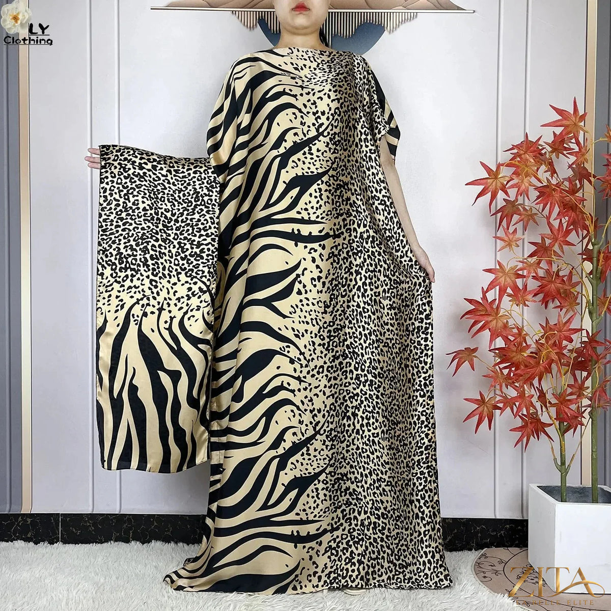 Women’s printed silk loose maxi summer dress by Zita La Belle Elite with belt and turban, featuring vibrant floral patterns.
