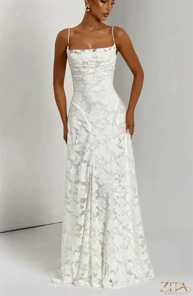 Elegant backless women's maxi evening dress with spaghetti straps and lace-up detail by Zita La Belle Elite.