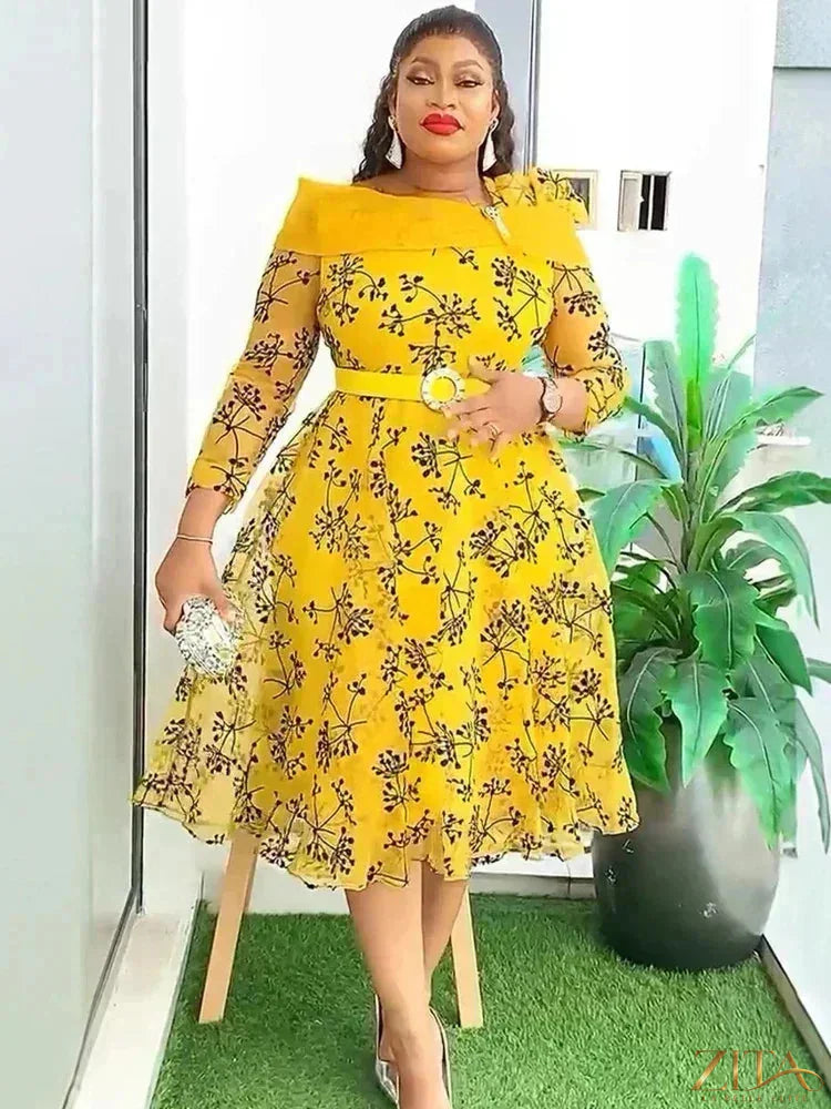 Zita La Belle Elite women's dashiki print midi evening dress with vibrant patterns and flowing fabric, suitable for formal occasions.