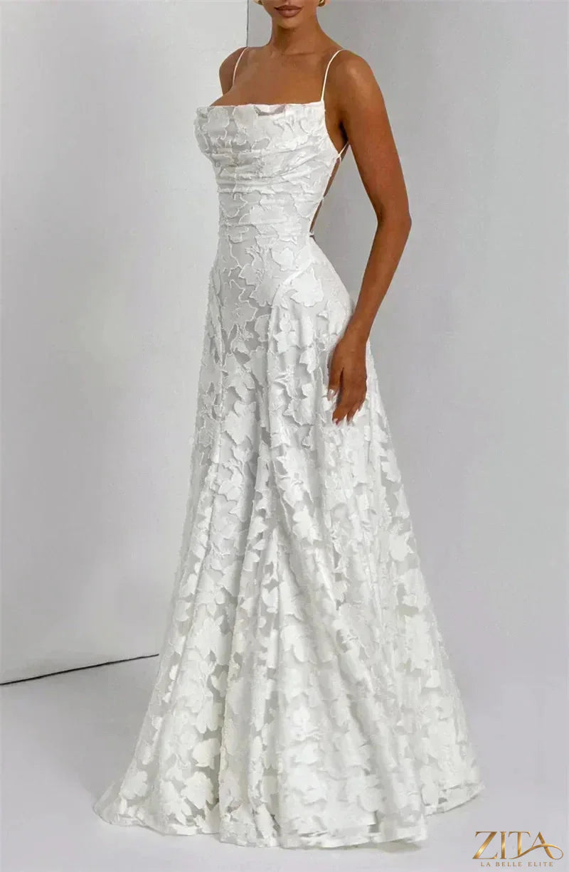Backless women’s spaghetti strap lace-up maxi evening dress by Zita La Belle Elite, flowing gown with elegant design and delicate lace details.