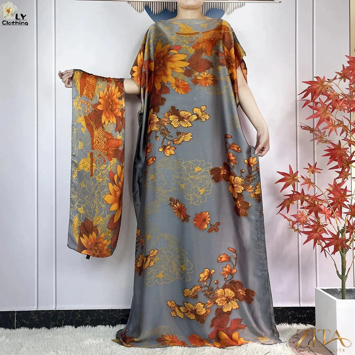 Women printed silk loose maxi summer dress with belt and turban by Zita La Belle Elite, featuring vibrant floral patterns and flowing fabric.