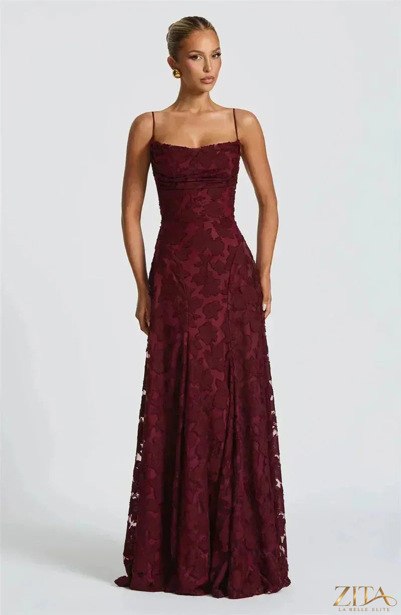 Elegant backless women's maxi evening dress with spaghetti straps and lace-up detail by Zita La Belle Elite.