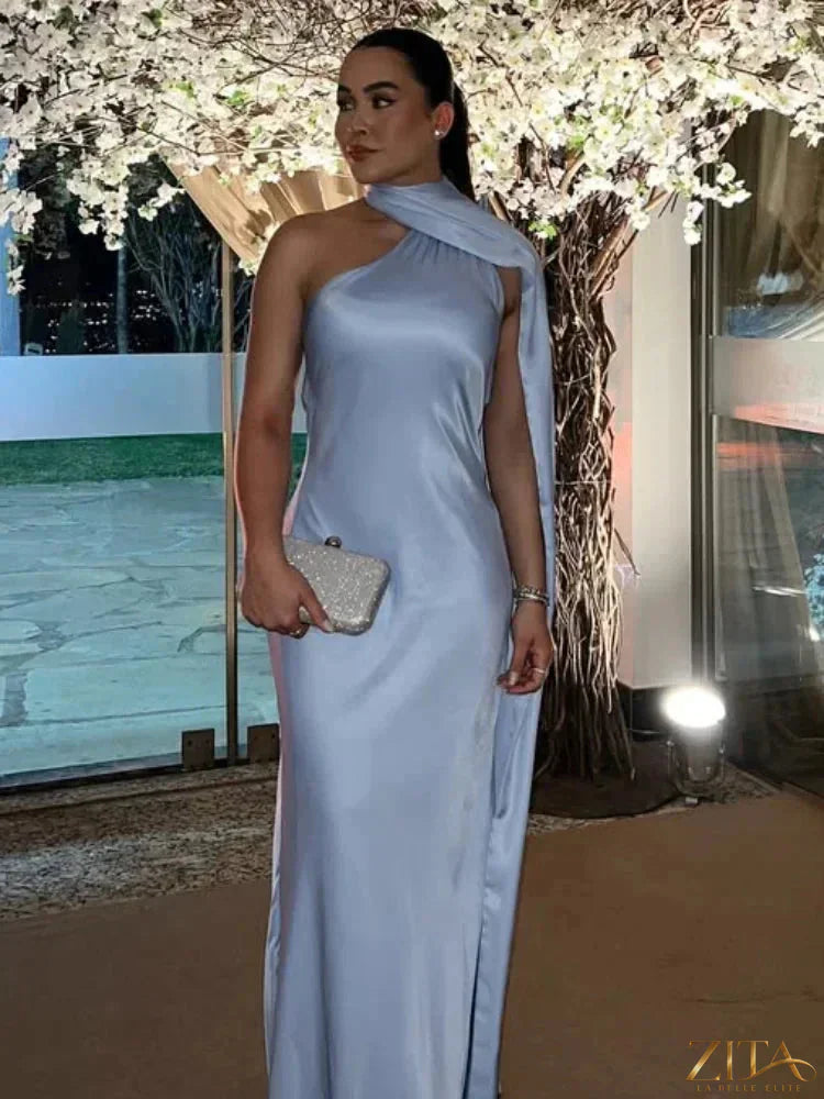 Backless lace-up maxi dress by Zita La Belle Elite, sleeveless evening gown with ribbon details, ideal for parties and formal events.