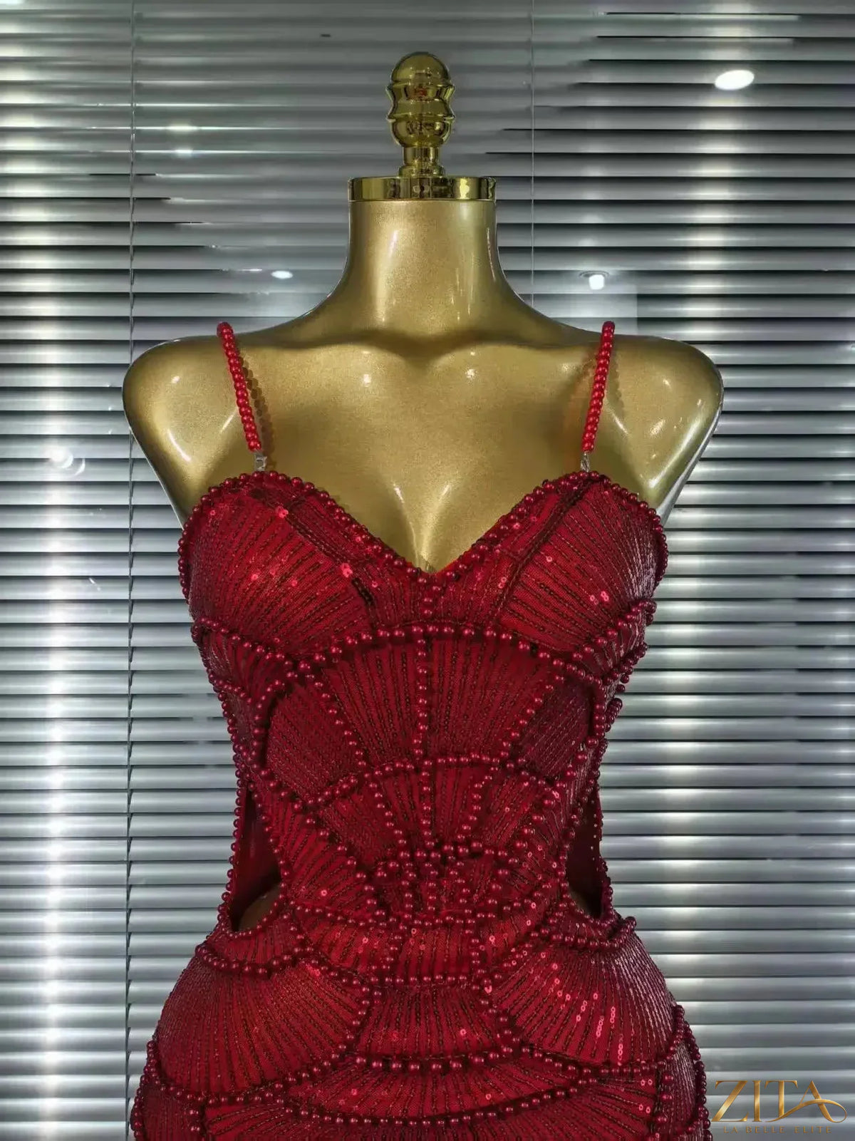 Sleeveless pearl beaded Christmas party dress by Zita La Belle Elite, bodycon style with elegant beaded details.
