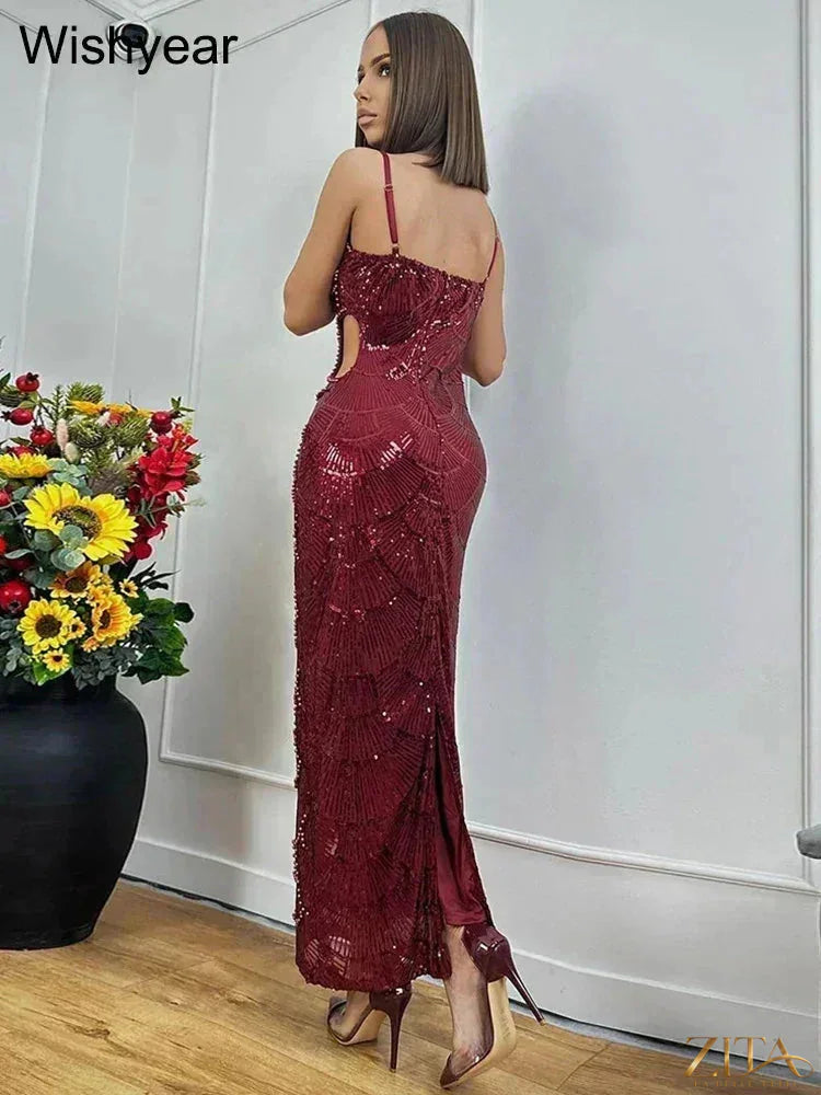 Elegant sequin backless mermaid evening gown with spaghetti straps by Zita La Belle Elite, featuring a fitted silhouette and shimmering details.