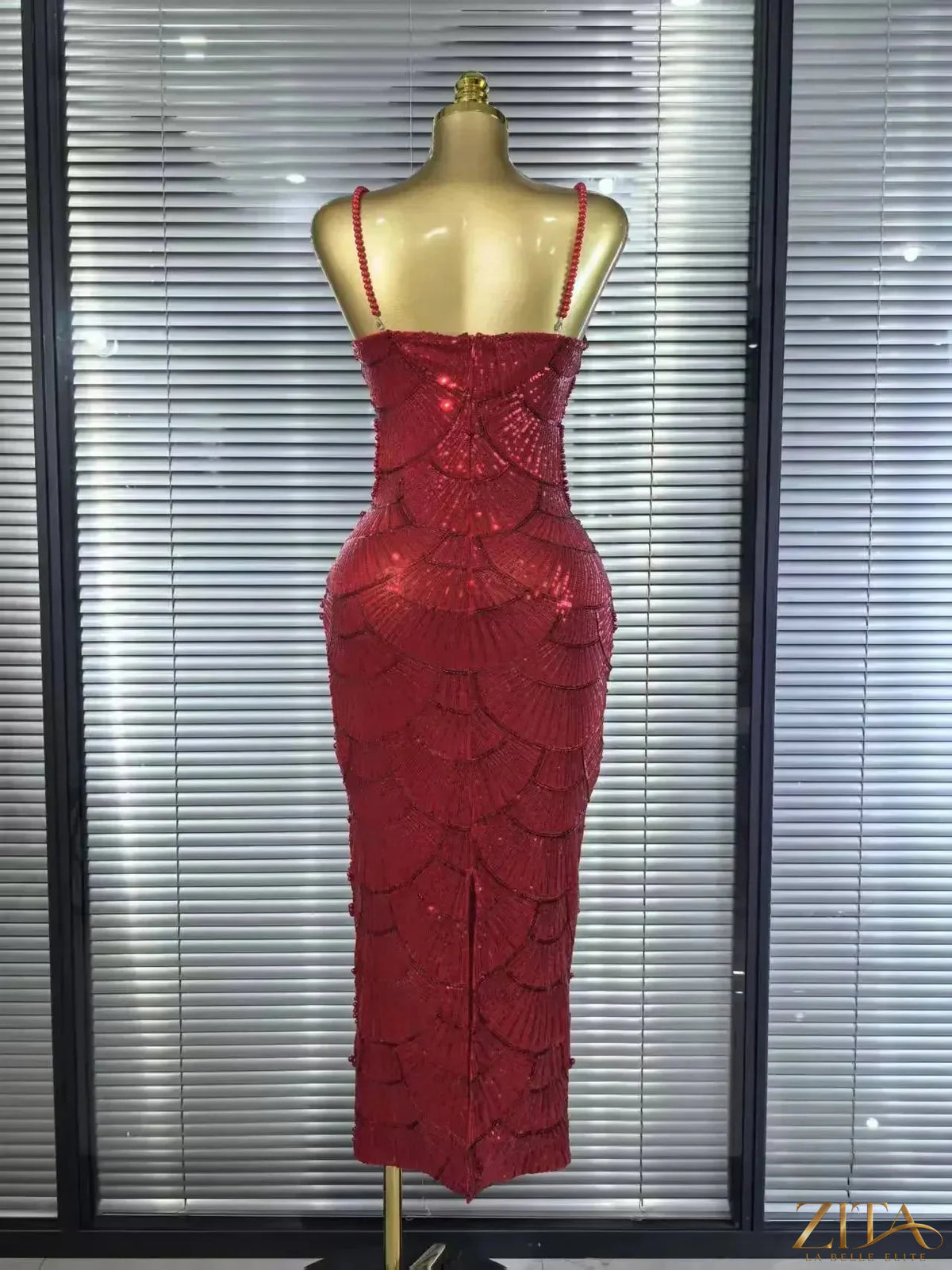 Sleeveless pearl beaded Christmas party dress by Zita La Belle Elite, fitted bodycon gown with elegant beaded details.