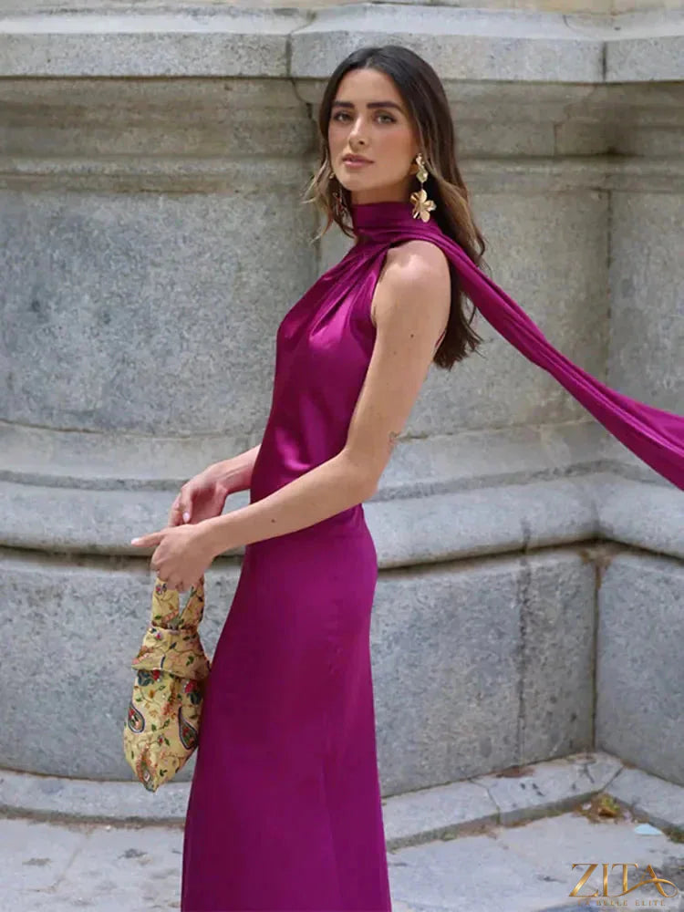 Backless lace-up maxi dress by Zita La Belle Elite featuring sleeveless ribbon design, perfect for evening parties.