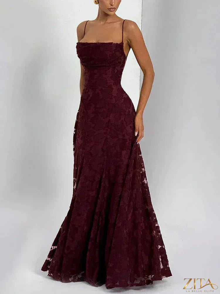 Elegant backless lace-up maxi evening dress for women, featuring spaghetti straps and flowing fabric by Zita La Belle Elite.