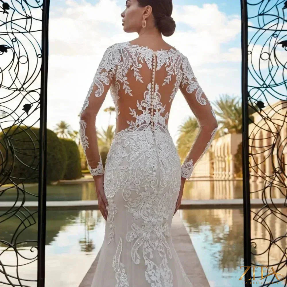 Elegant boho mermaid wedding dress by Zita La Belle Elite with long lace sleeves, customizable bridal gown for special occasions.