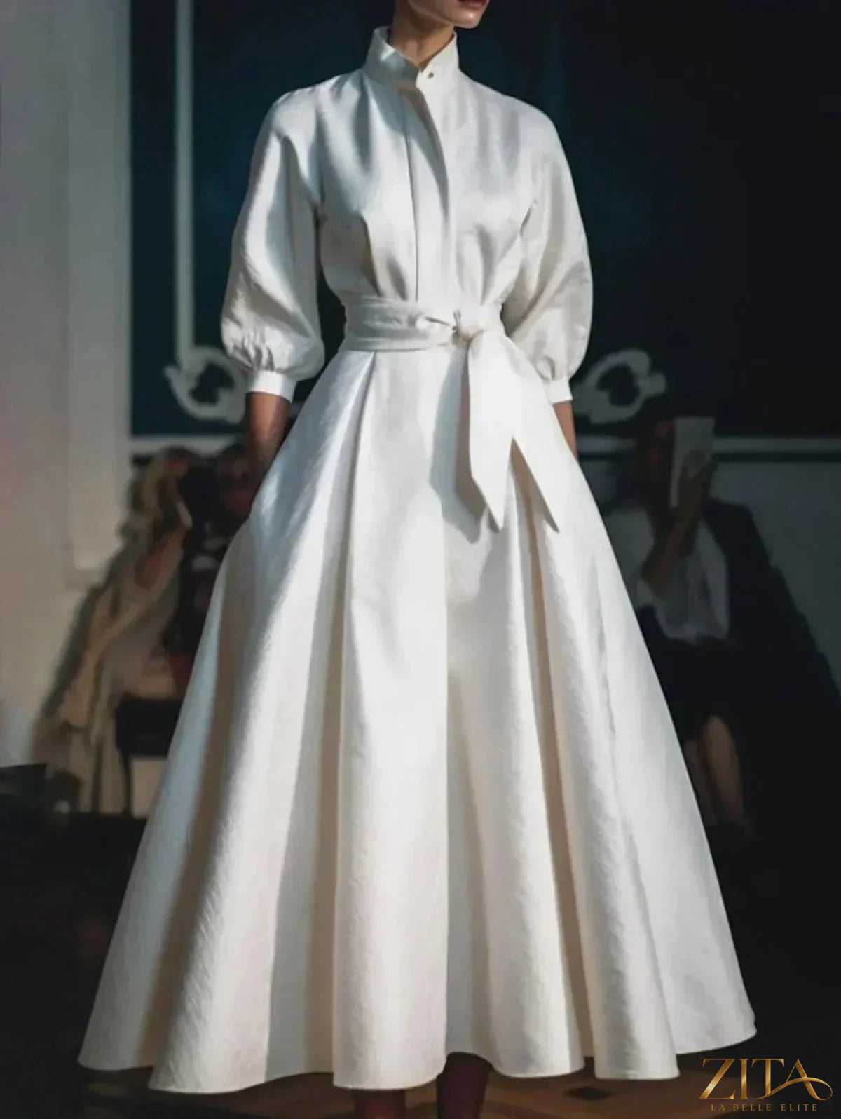Zita La Belle Elite stand collar belted midi shirt dress displayed on a hanger with buttons and long sleeves.