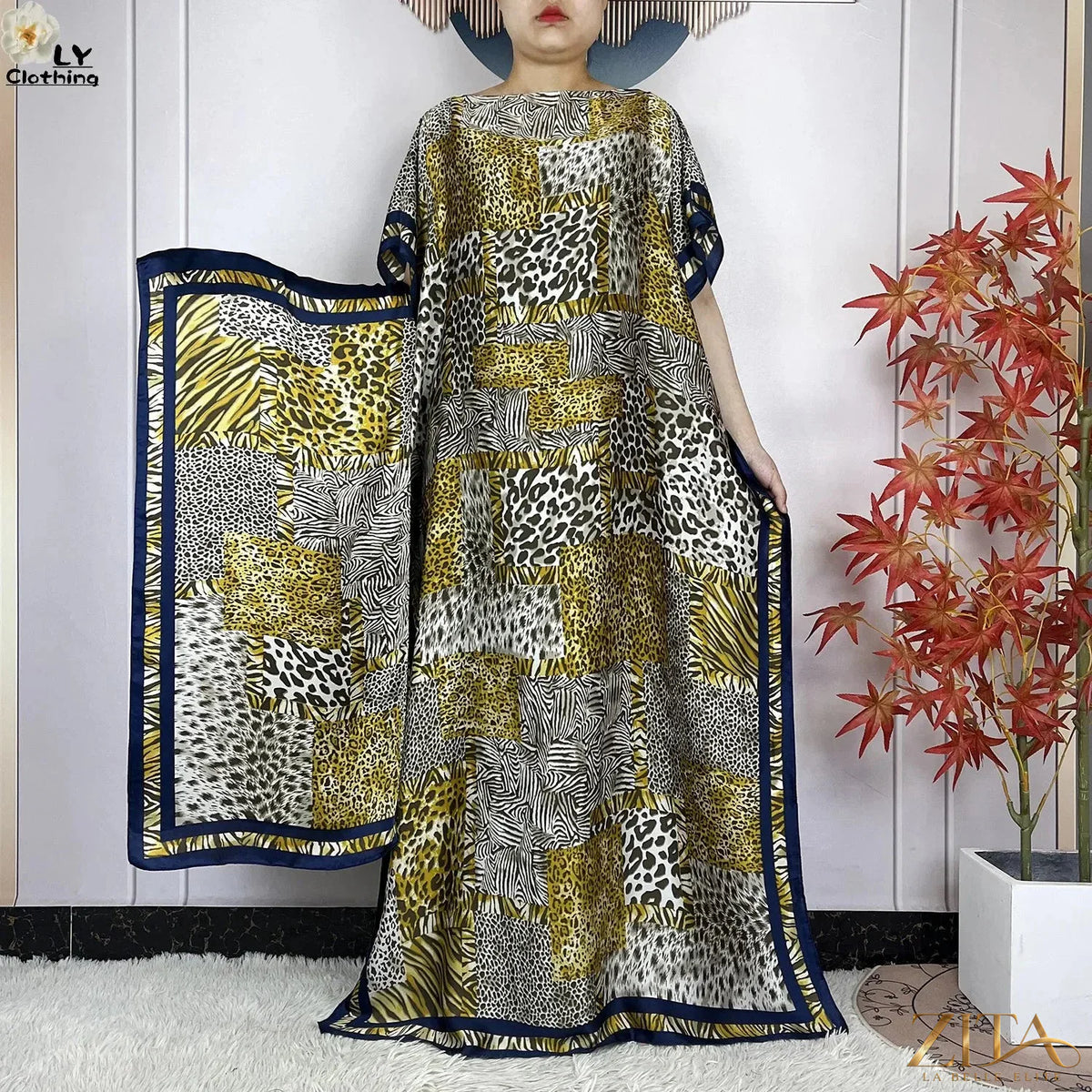 Women printed silk loose maxi summer dress with belt and turban by Zita La Belle Elite, featuring vibrant floral patterns and flowing fabric.