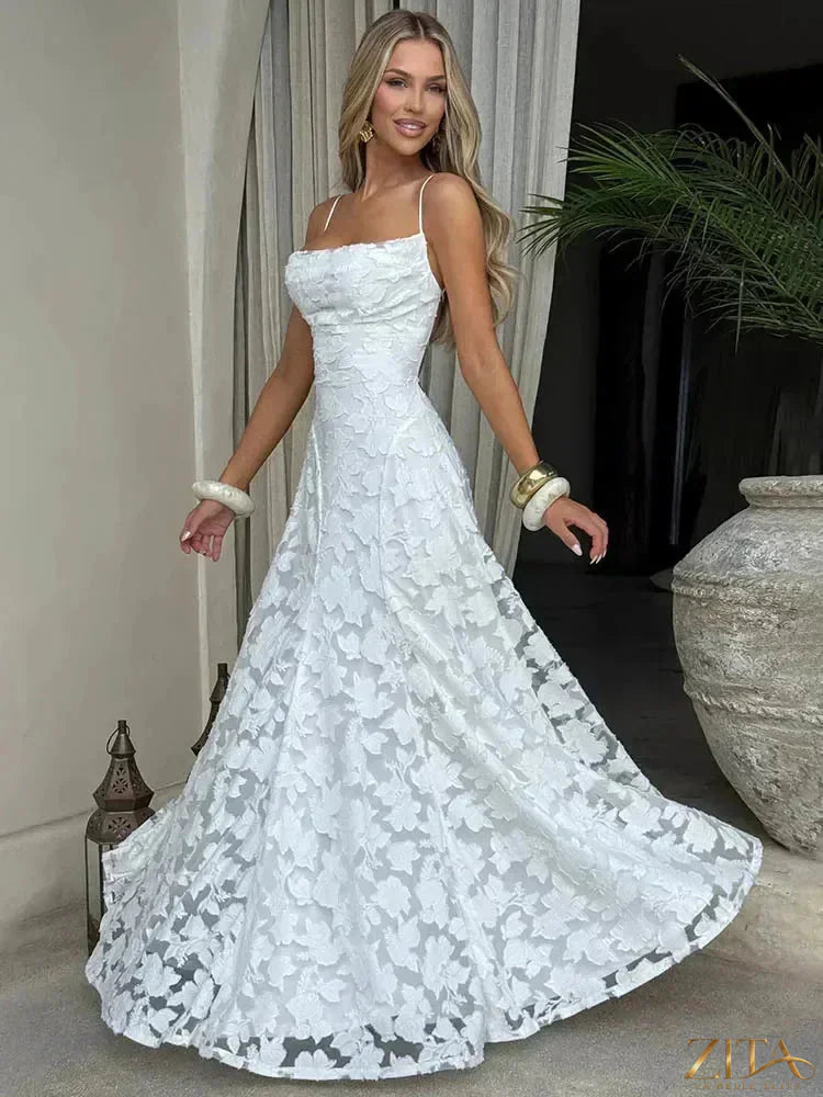 Backless spaghetti strap lace-up maxi evening dress by Zita La Belle Elite featuring elegant lace details and flowing fabric.