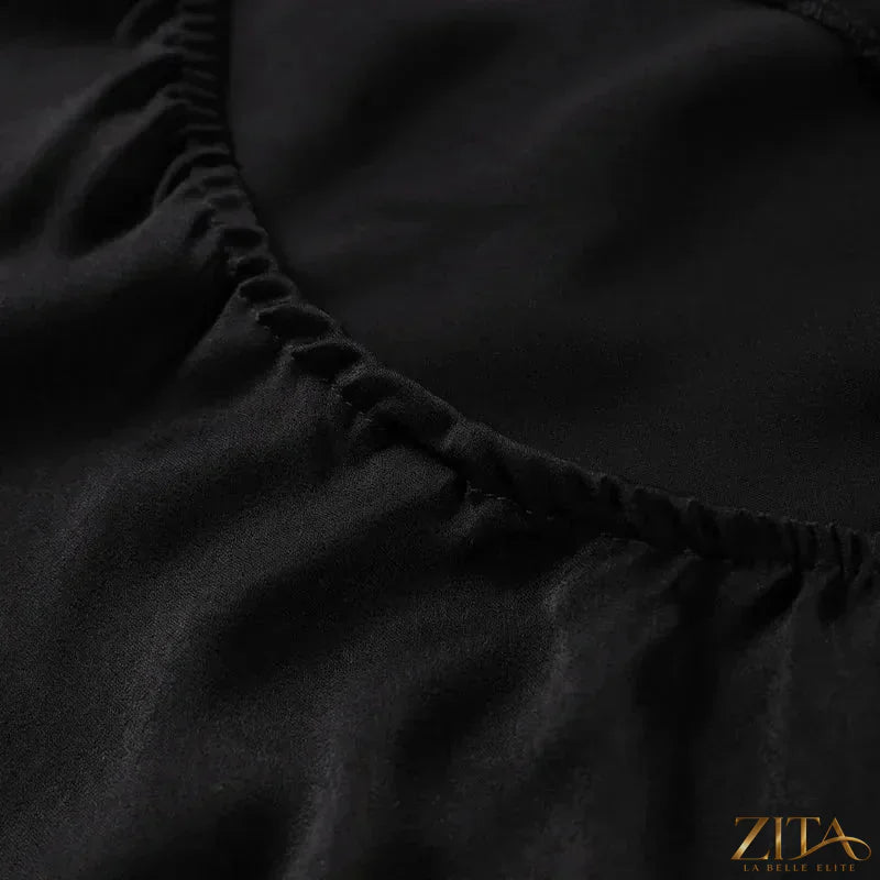Backless lace-up maxi dress by Zita La Belle Elite featuring ribbon straps and a sleeveless design, perfect for evening parties.