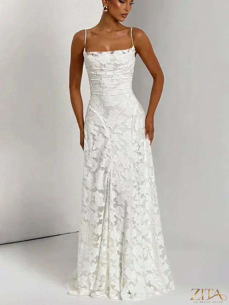 Elegant backless maxi evening dress with spaghetti straps and lace-up detail, designed by Zita La Belle Elite for women.