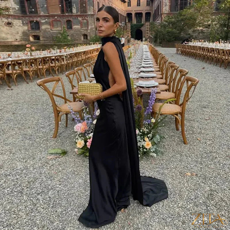 Backless lace-up maxi dress by Zita La Belle Elite featuring a sleeveless design and ribbon accents, perfect for evening parties.