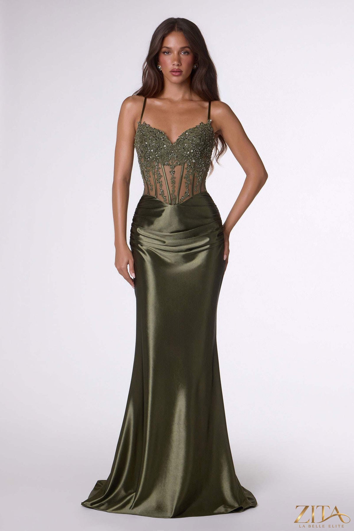 Olive green fitted stretch satin sheer corset mermaid gown by Zita La Belle Elite, front view showcasing elegant design and figure-hugging fit.