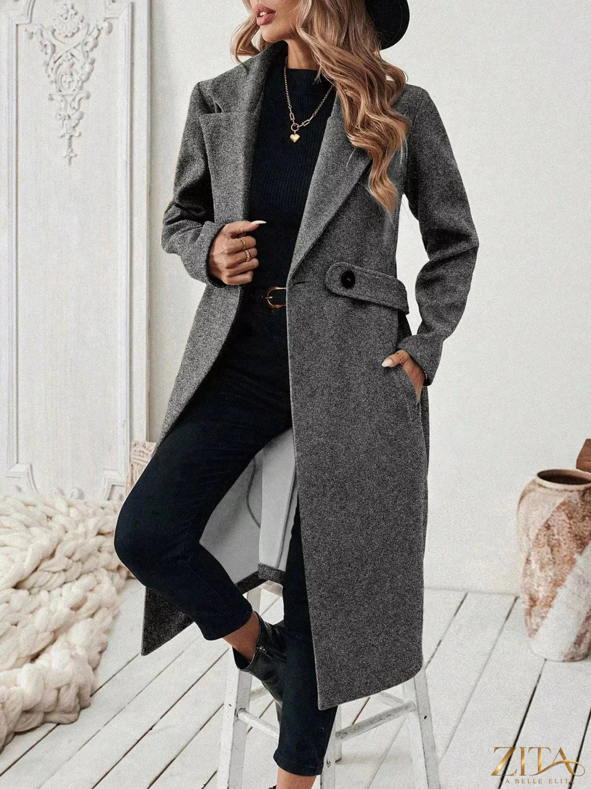 Zita La Belle Elite longline coat with lapel collar, stylish and elegant in a sleek, tailored design, shown on a model.