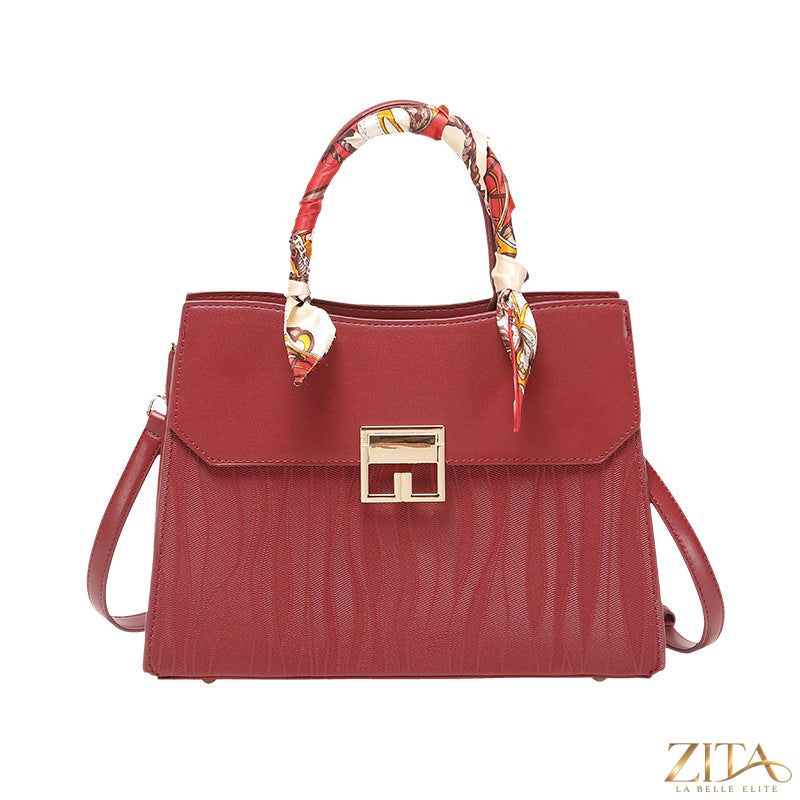 Zita La Belle Elite leather handbag with scarf decor, featuring a stylish, textured design and elegant hand-stitched details.