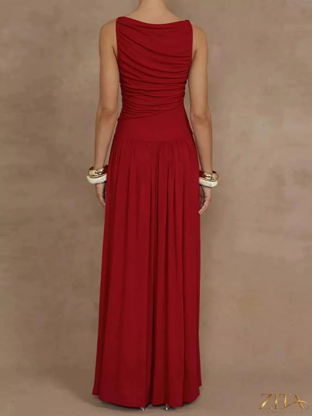 Zita La Belle Elite ruched sleeveless maxi dress in flowing fabric, showcasing a fitted bodice and elegant, floor-length design.