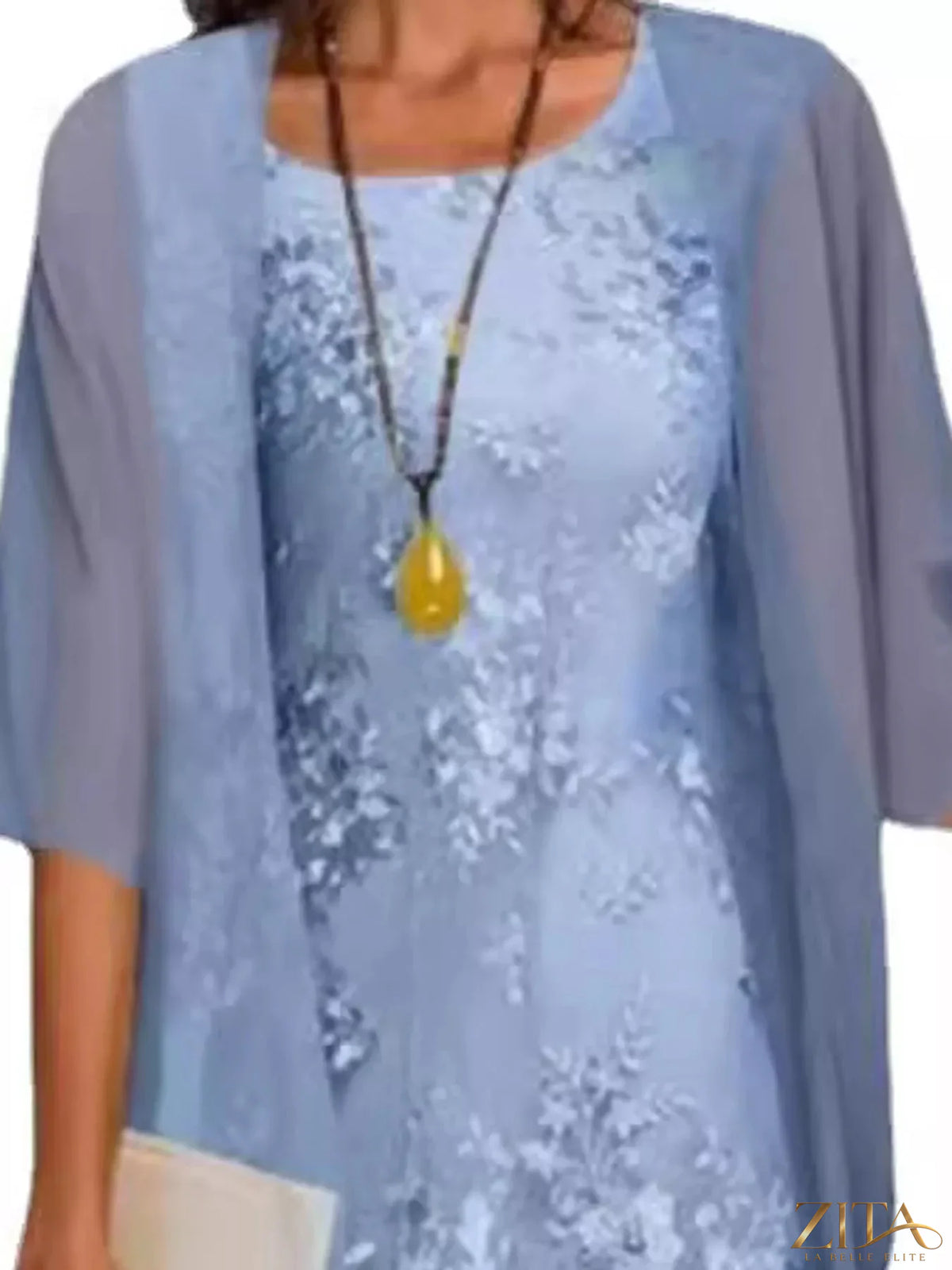 Plus size elegant lace overlay dress with matching chiffon cardigan by Zita La Belle Elite, shown on a mannequin.