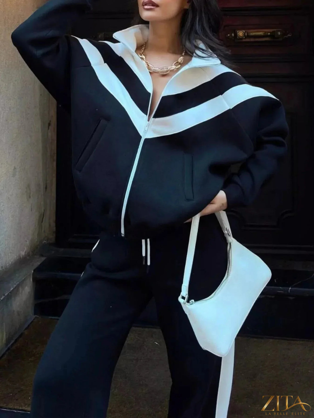 Zita La Belle Elite color block zip-up outerwear and pants set featuring vibrant mixed colors and sporty design.